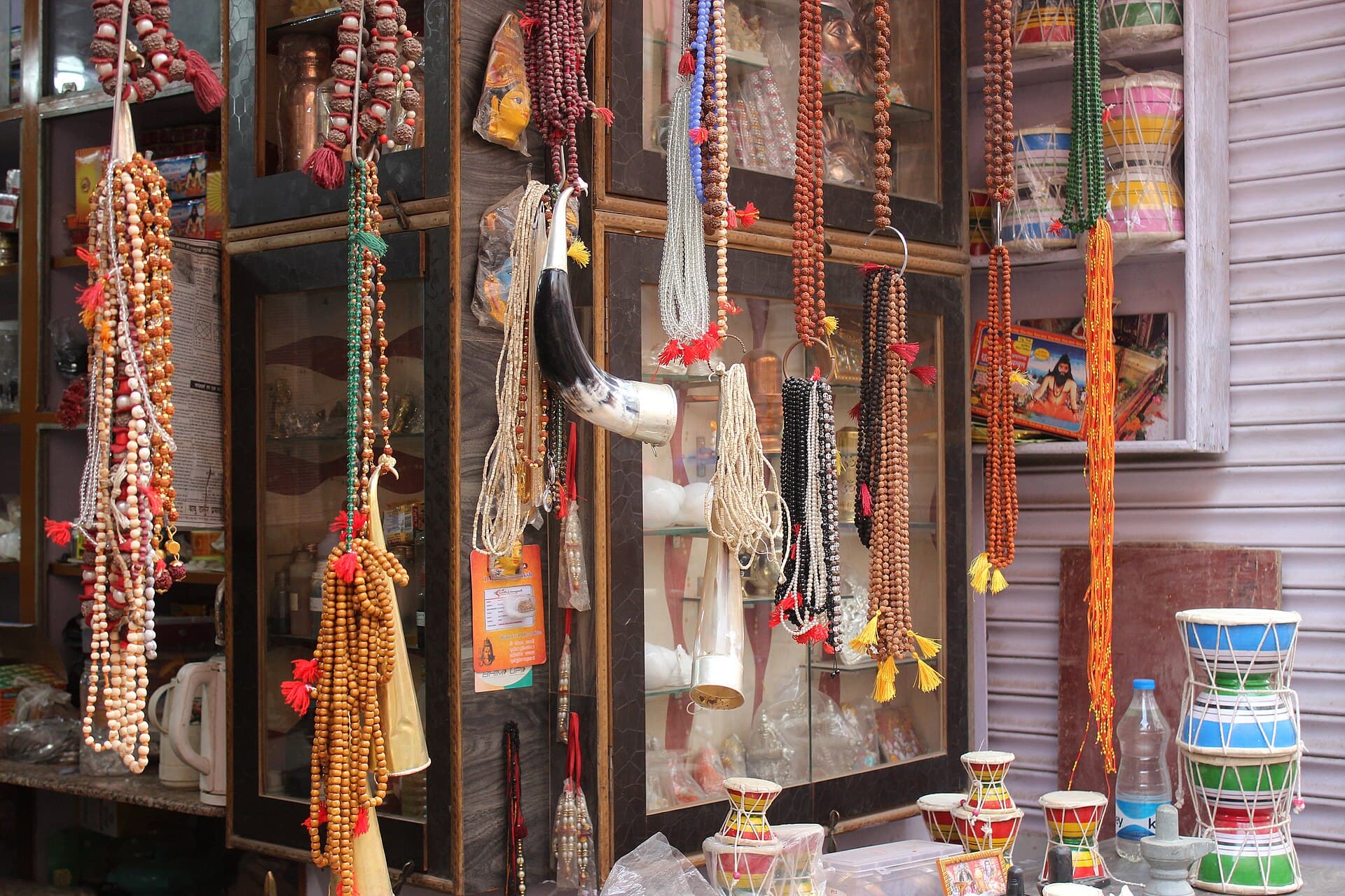 A beginner's selection of wooden bead bracelets laid on linen