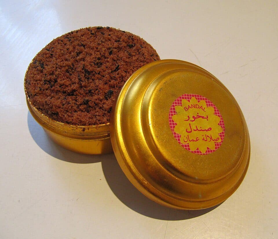 Close-up of authentic sandalwood beads showing natural grain